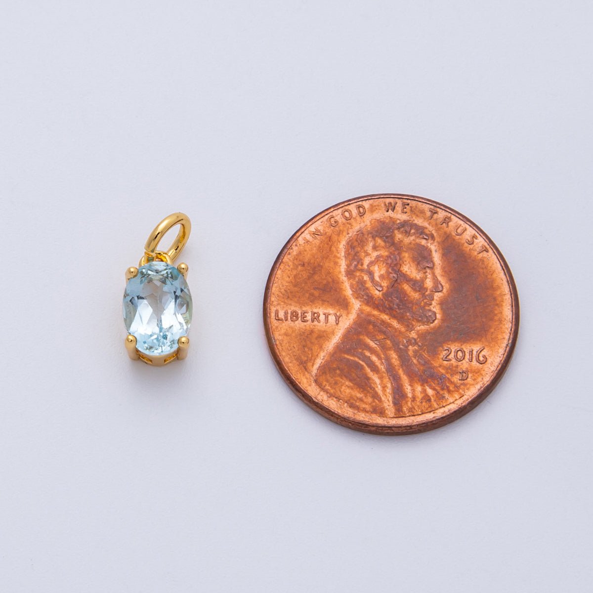18K Gold Filled 8.8mm Light Blue CZ Oval Birthstone Charm | Charms-00330